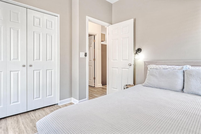32 Walden Way, New Buffalo, MI 49117 - bedroom featuring light wood-style floors and a closet