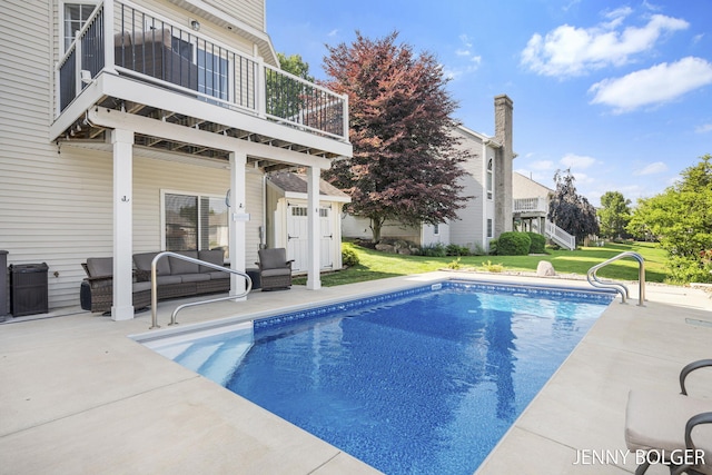 7066 Country Springs Dr SW, Byron Center, MI 49315 - outdoor pool with a yard, a patio, and outdoor lounge area