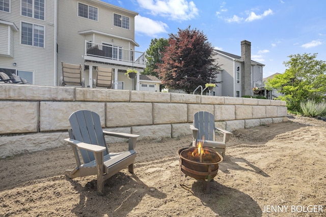 7066 Country Springs Dr SW, Byron Center, MI 49315 - view of yard with a fire pit and a balcony