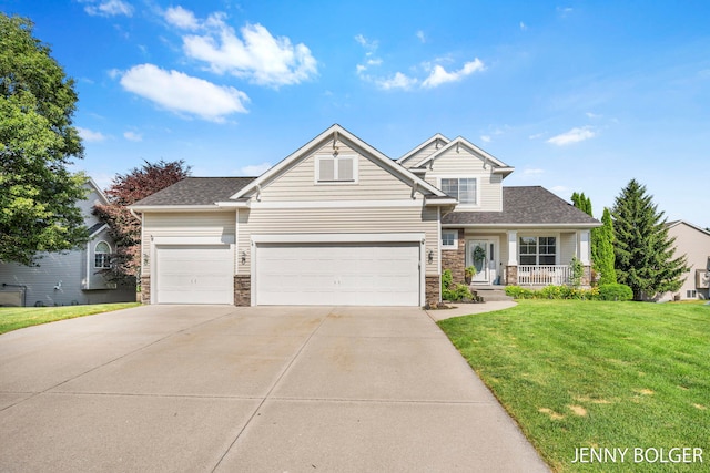 7066 Country Springs Dr SW, Byron Center, MI 49315 - view of front of house with a front yard, concrete driveway, an attached garage, a porch, and stone siding