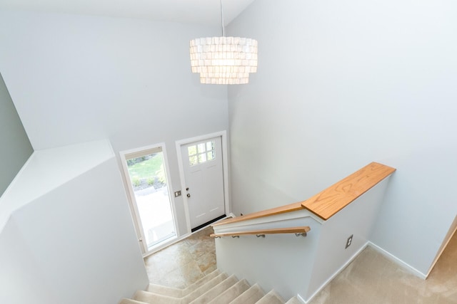 266 Westover Ave, Ann Arbor, MI 48103 - stairway with a high ceiling and baseboards