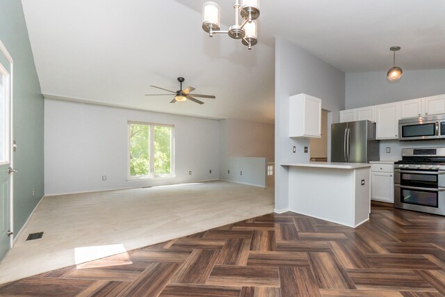 266 Westover Ave, Ann Arbor, MI 48103 - kitchen with appliances with stainless steel finishes, open floor plan, white cabinets, light countertops, and pendant lighting