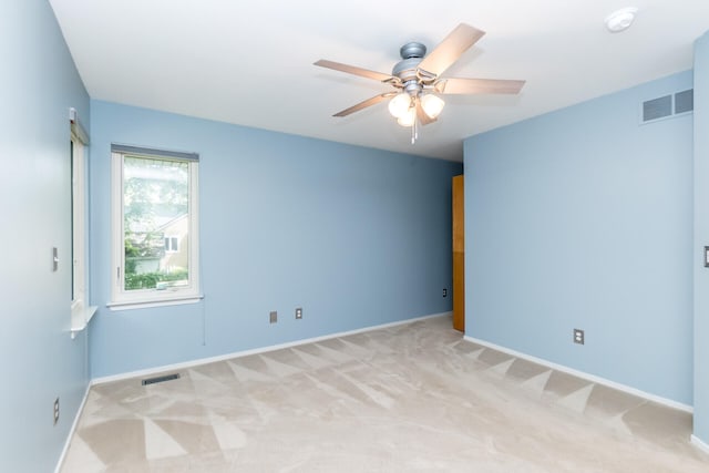 266 Westover Ave, Ann Arbor, MI 48103 - unfurnished room with light colored carpet, a ceiling fan, and a smoke detector