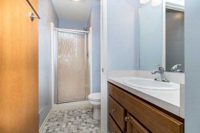 266 Westover Ave, Ann Arbor, MI 48103 - bathroom with a shower stall, vanity, and tile patterned flooring