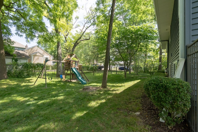 266 Westover Ave, Ann Arbor, MI 48103 - fenced backyard featuring a playground