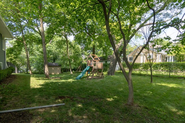 266 Westover Ave, Ann Arbor, MI 48103 - view of yard featuring a playground and a storage shed