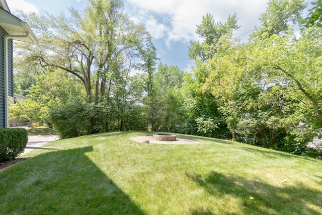 266 Westover Ave, Ann Arbor, MI 48103 - view of grassy yard with a fire pit