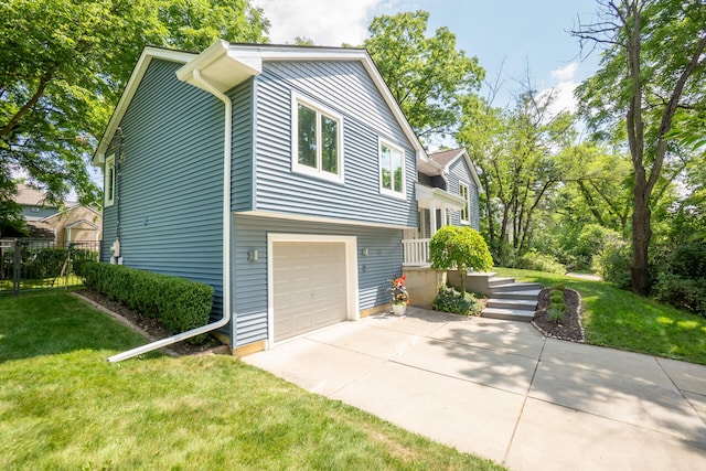 266 Westover Ave, Ann Arbor, MI 48103 - view of home's exterior with concrete driveway and a garage