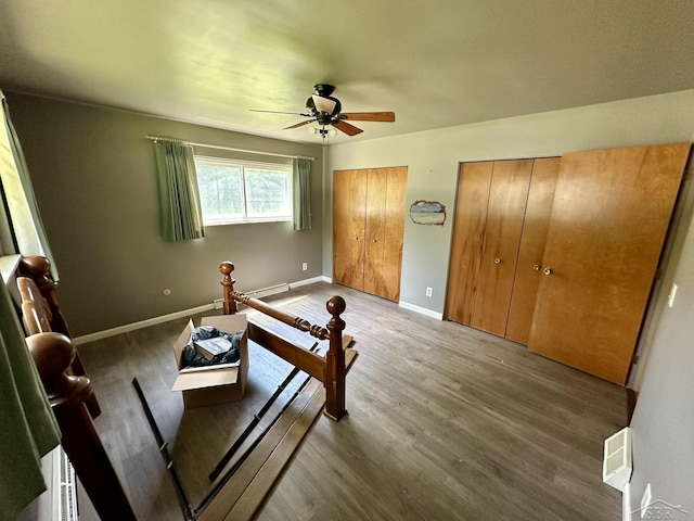 4650 Village Dr, Saginaw, MI 48638 - living area featuring a ceiling fan and wood finished floors