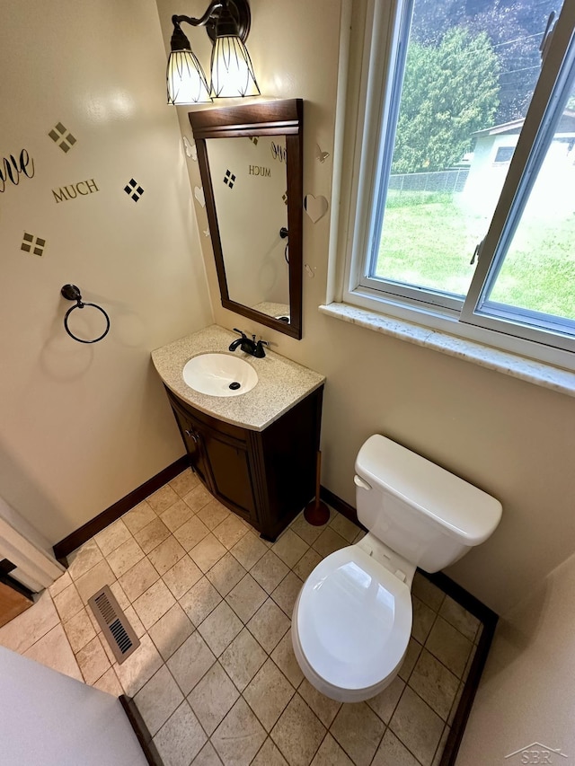 4650 Village Dr, Saginaw, MI 48638 - half bath with vanity and tile patterned flooring