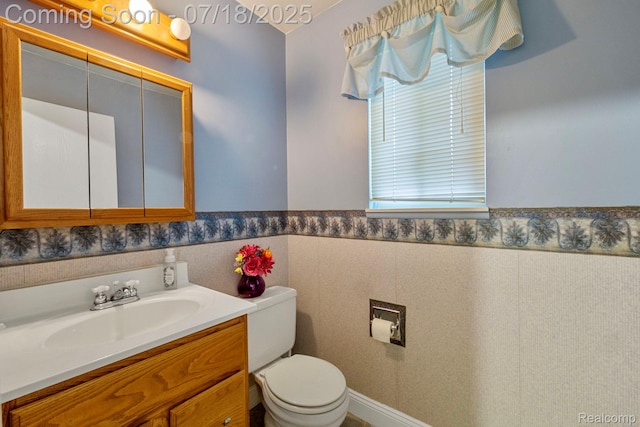 8400 Oak Shade Ct, Davison, MI 48423 - half bath featuring vanity and a wainscoted wall