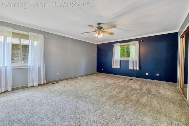 8400 Oak Shade Ct, Davison, MI 48423 - empty room featuring carpet, ornamental molding, and ceiling fan