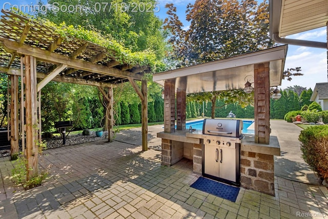 8400 Oak Shade Ct, Davison, MI 48423 - view of patio featuring an outdoor kitchen and a pergola