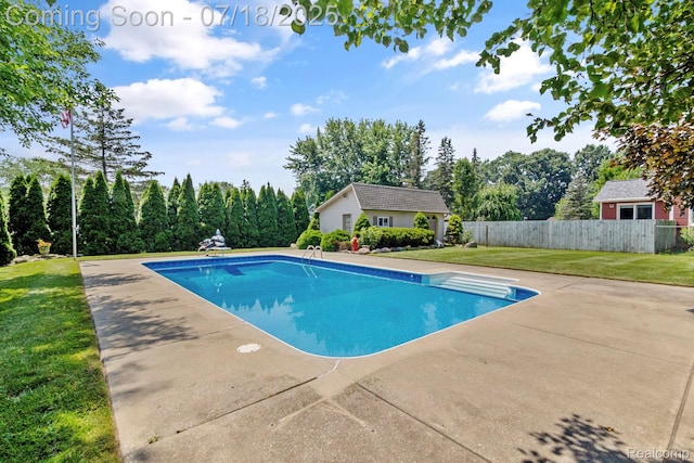 8400 Oak Shade Ct, Davison, MI 48423 - view of swimming pool with an outbuilding and a patio