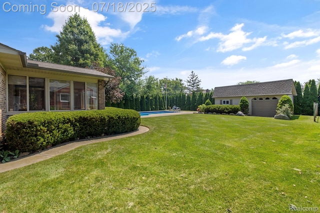 8400 Oak Shade Ct, Davison, MI 48423 - view of green lawn featuring an outdoor pool, a sunroom, and an outdoor structure