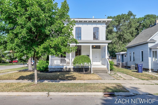 334 Washington Blvd, Holland, MI 49423 - italianate-style house with a porch