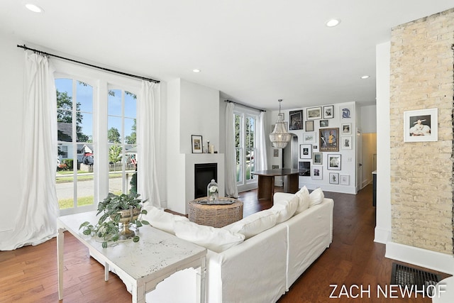 334 Washington Blvd, Holland, MI 49423 - living room featuring wood finished floors, a fireplace, and recessed lighting