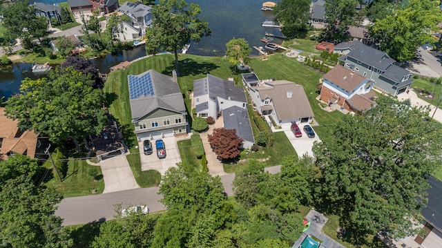 2323 Solano Dr, Wolverine Lake, MI 48390 - aerial overview of property's location with nearby suburban area and a nearby body of water