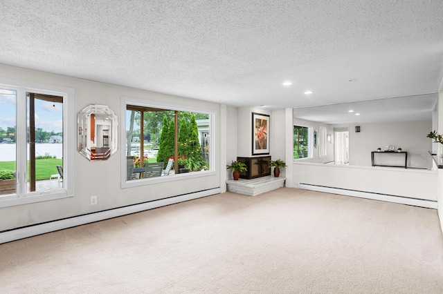 2323 Solano Dr, Wolverine Lake, MI 48390 - unfurnished living room with a baseboard radiator, recessed lighting, carpet floors, a textured ceiling, and a water view
