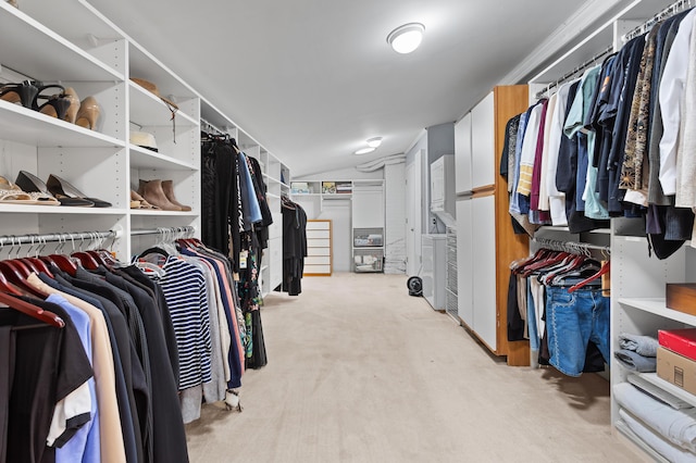 2323 Solano Dr, Wolverine Lake, MI 48390 - spacious closet featuring light carpet and lofted ceiling