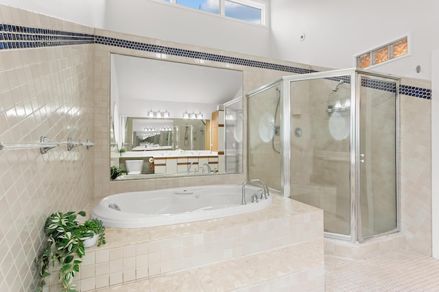 2323 Solano Dr, Wolverine Lake, MI 48390 - full bath featuring a garden tub, a shower stall, vanity, and tile patterned floors