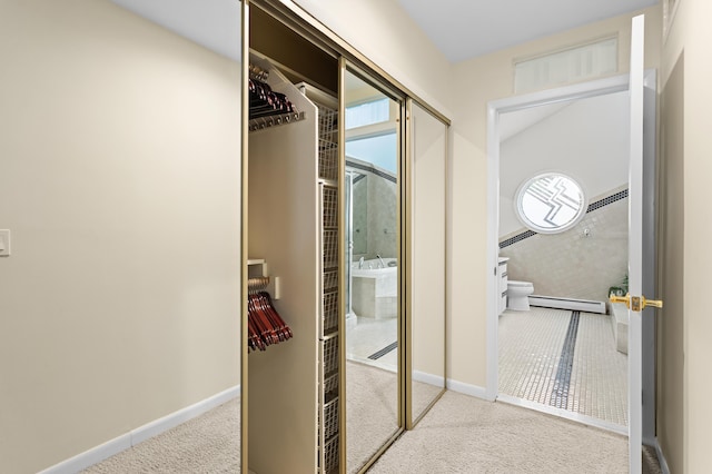 2323 Solano Dr, Wolverine Lake, MI 48390 - hall featuring a baseboard radiator and carpet flooring