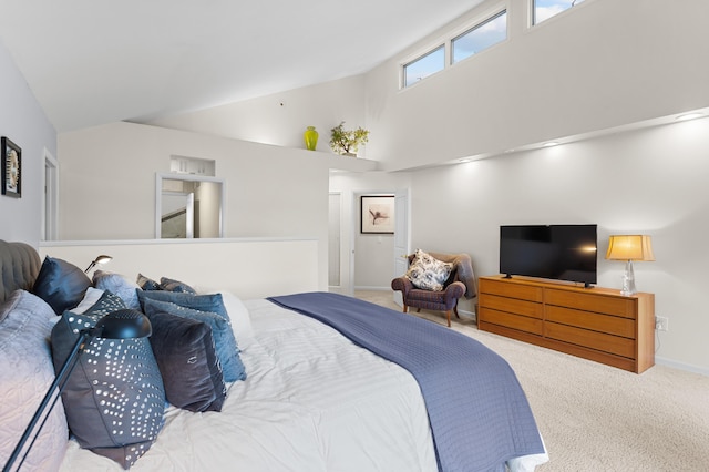 2323 Solano Dr, Wolverine Lake, MI 48390 - carpeted bedroom with high vaulted ceiling and baseboards