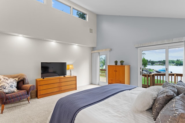 2323 Solano Dr, Wolverine Lake, MI 48390 - carpeted bedroom featuring high vaulted ceiling, access to outside, and multiple windows