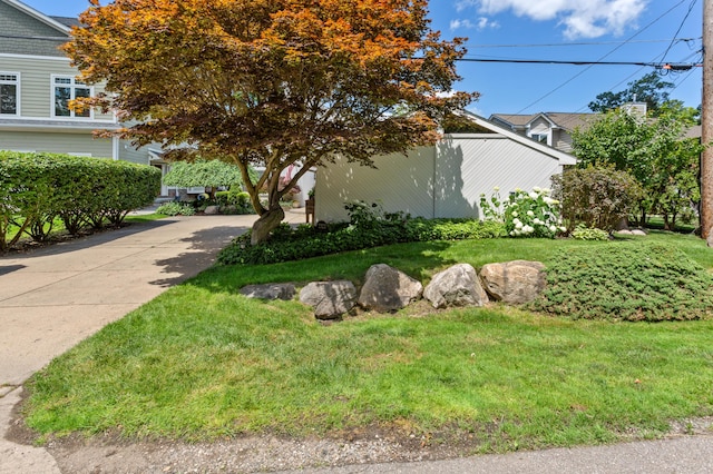 2323 Solano Dr, Wolverine Lake, MI 48390 - view of side of property with a yard