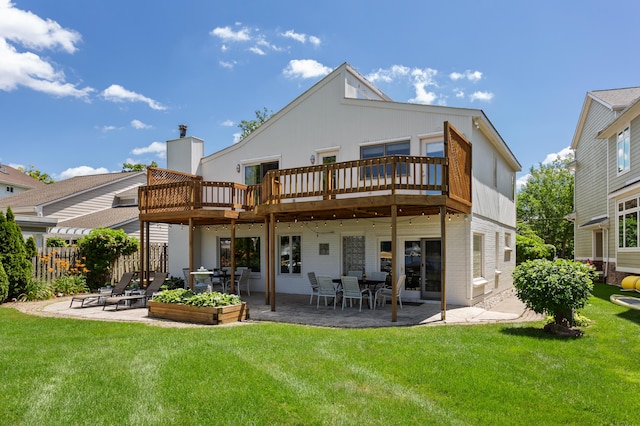 2323 Solano Dr, Wolverine Lake, MI 48390 - back of property featuring a patio area and a wooden deck