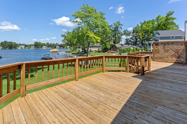 2323 Solano Dr, Wolverine Lake, MI 48390 - wooden terrace featuring a water view and a lawn