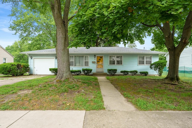 76 Taft St, Battle Creek, MI 49014 - single story home featuring an attached garage and concrete driveway