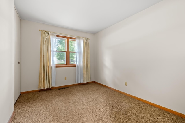 76 Taft St, Battle Creek, MI 49014 - spare room featuring carpet flooring