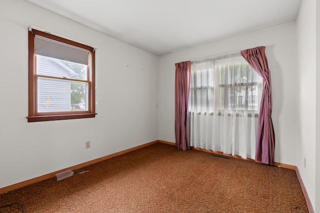 76 Taft St, Battle Creek, MI 49014 - spare room with carpet and baseboards