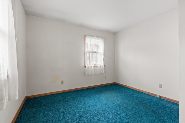 76 Taft St, Battle Creek, MI 49014 - unfurnished room featuring carpet and baseboards
