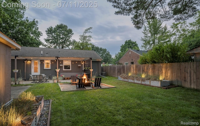 4412 Buckingham Rd, Royal Oak, MI 48073 - fenced backyard featuring an outdoor fire pit and a patio