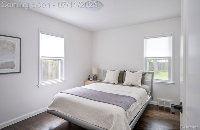 4412 Buckingham Rd, Royal Oak, MI 48073 - bedroom featuring baseboards and wood finished floors