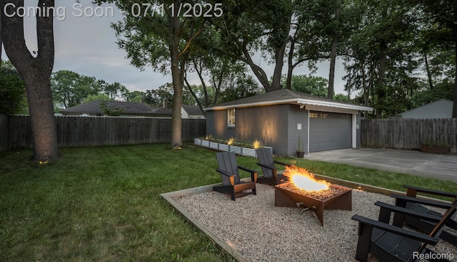 4412 Buckingham Rd, Royal Oak, MI 48073 - fenced backyard with an outdoor fire pit, an outdoor structure, a patio area, and driveway