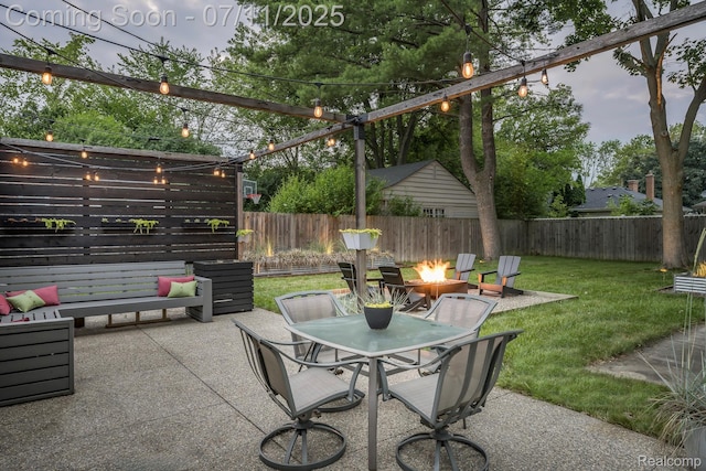 4412 Buckingham Rd, Royal Oak, MI 48073 - fenced backyard with an outdoor fire pit, a patio area, and outdoor dining area