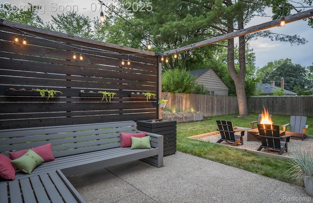4412 Buckingham Rd, Royal Oak, MI 48073 - fenced backyard featuring an outdoor fire pit and a patio area