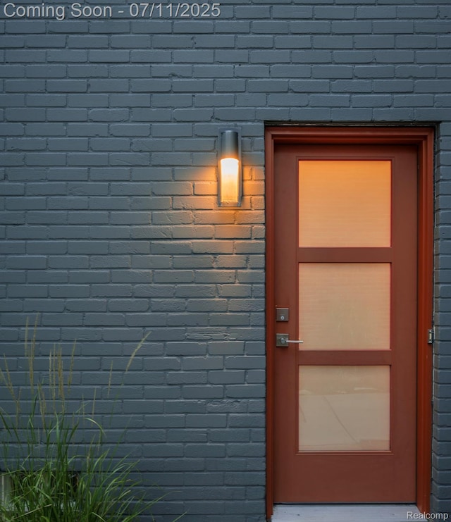 4412 Buckingham Rd, Royal Oak, MI 48073 - view of exterior entry with brick siding