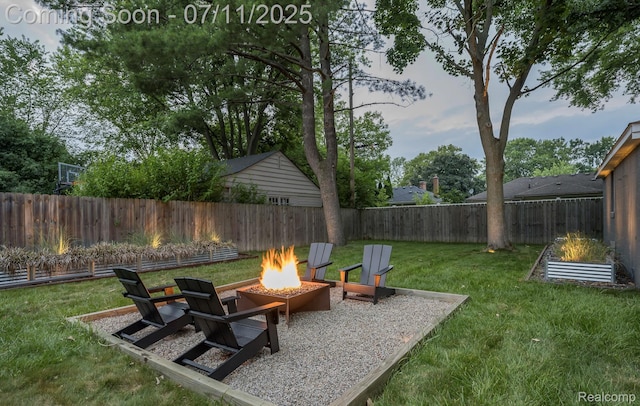4412 Buckingham Rd, Royal Oak, MI 48073 - fenced backyard featuring a fire pit