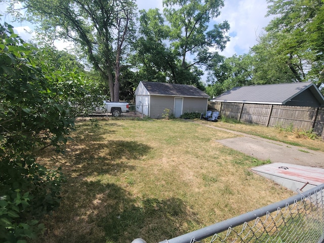 560 Lydia St NE, Grand Rapids, MI 49503 - fenced backyard with an outdoor structure