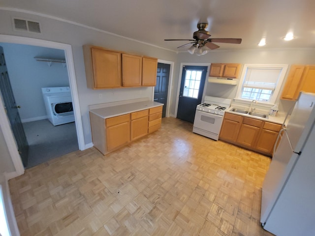 560 Lydia St NE, Grand Rapids, MI 49503 - kitchen featuring washer / dryer, white appliances, ceiling fan, light countertops, and under cabinet range hood