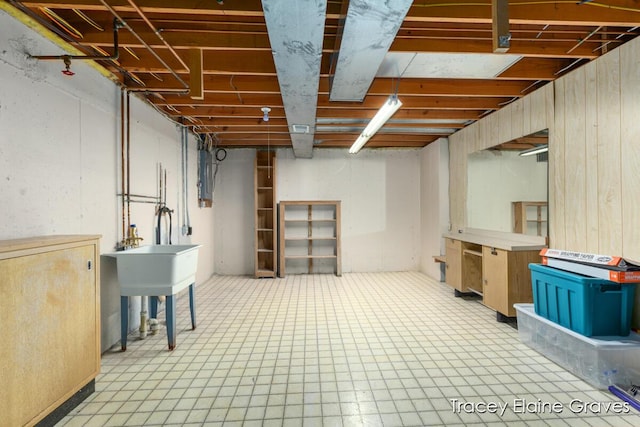 6305 Greenway Dr SE Unit 51, Grand Rapids, MI 49546 - unfinished below grade area with electric panel and light floors