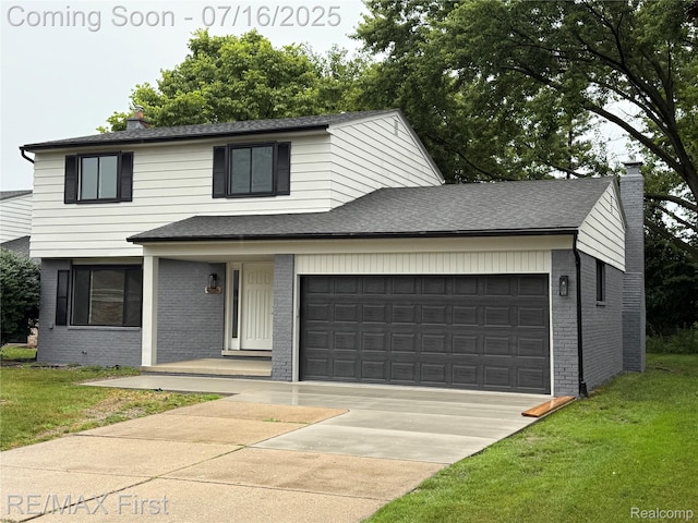 40866 Rinaldi Dr, Sterling Heights, MI 48313 - view of front of property featuring brick siding, a chimney, a front lawn, and concrete driveway