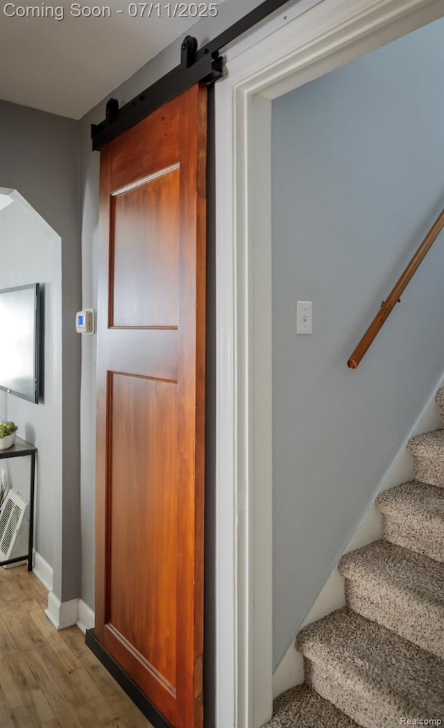 1416 N Alexander Ave, Royal Oak, MI 48067 - stairs featuring wood finished floors and a barn door