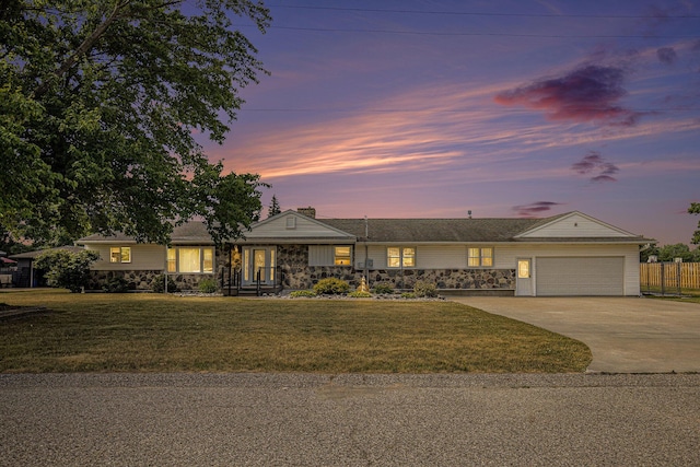236 Jeffrey St NE, Cedar Springs, MI 49319 - single story home with concrete driveway, a garage, and stone siding