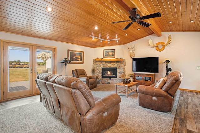 236 Jeffrey St NE, Cedar Springs, MI 49319 - living area featuring wood ceiling, wood finished floors, a ceiling fan, a stone fireplace, and recessed lighting