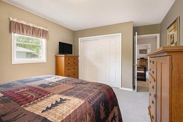 236 Jeffrey St NE, Cedar Springs, MI 49319 - carpeted bedroom featuring a closet and baseboards